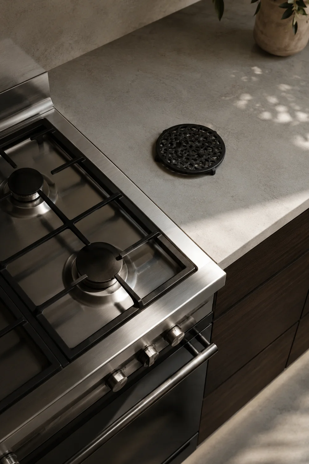 Cast iron trivet as the only object left beside a clean stovetop